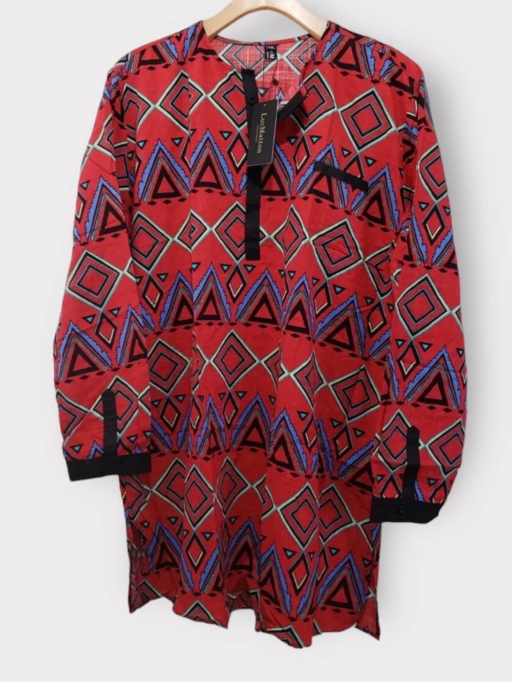 Bold Red Geometric Tunic with Contrasting Trim